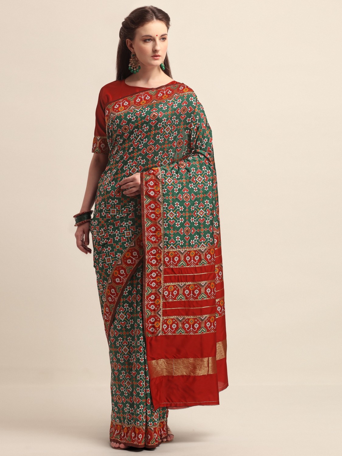 KAPAAHA Woven Dil Patola Saree (Dark Green)